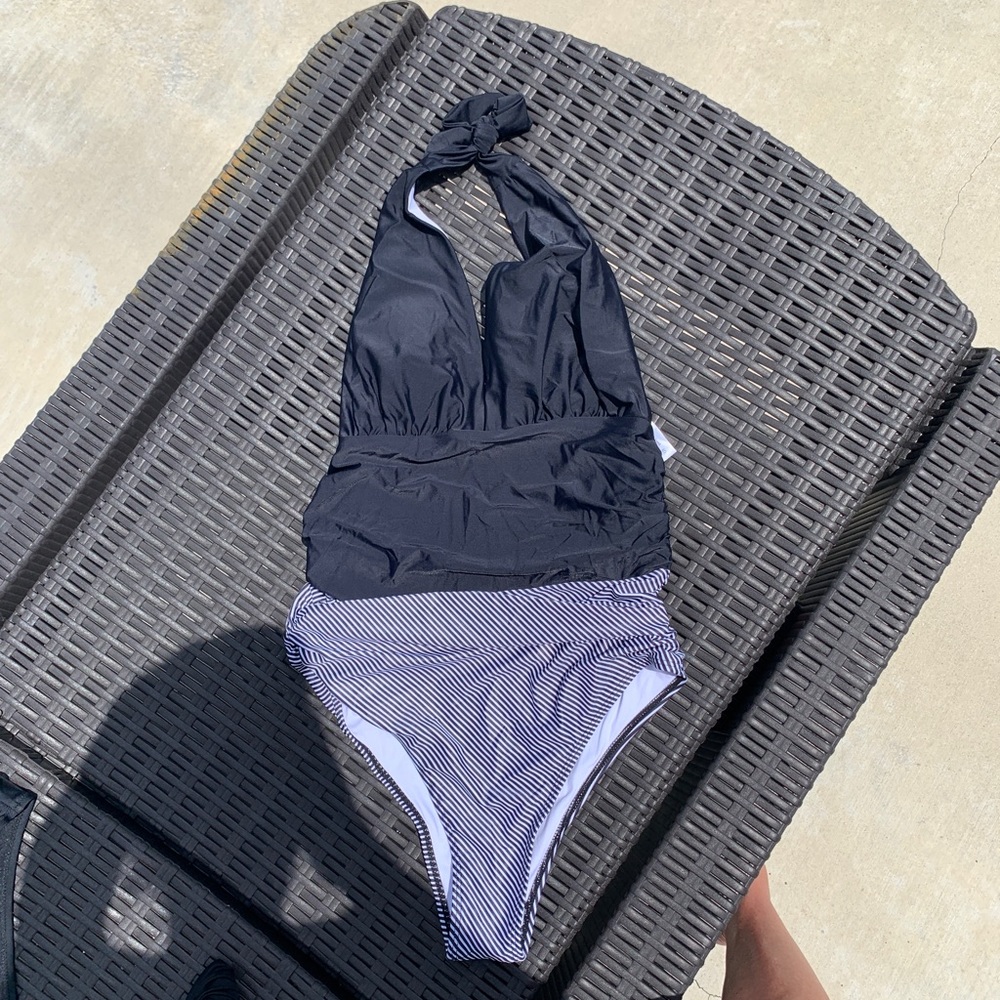NWOT ONE PIECE. Figure flattering